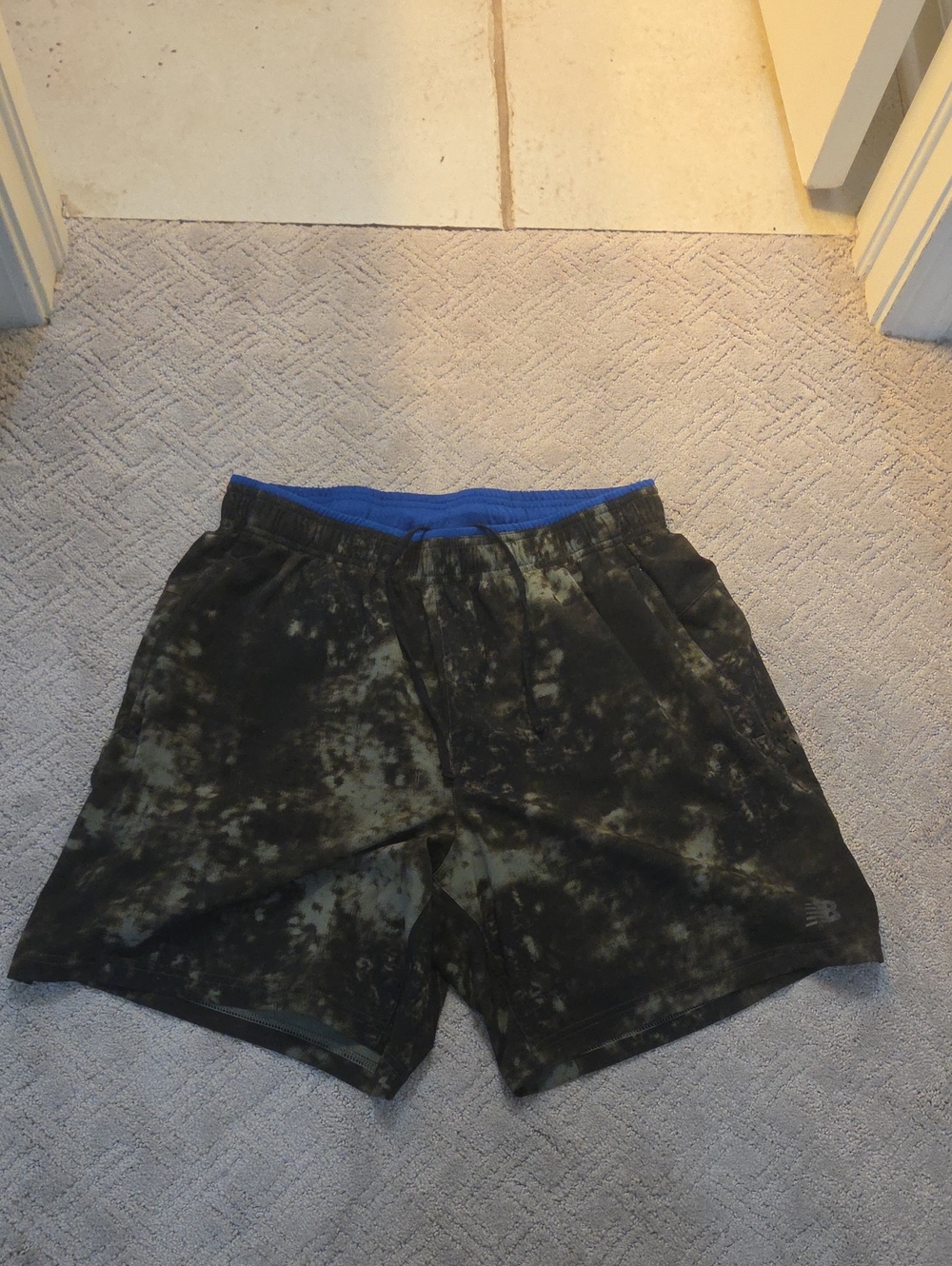 New Balance Men's Black and Olive Tie-Dye Athletic Shorts with Blue Waistband